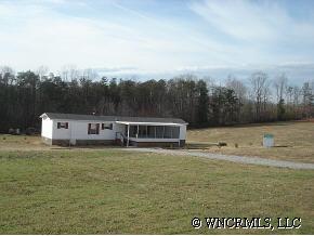 601 Parris Road Rutherfordton, NC 28139 - Photo 3 of 12 a view of a house with a yard