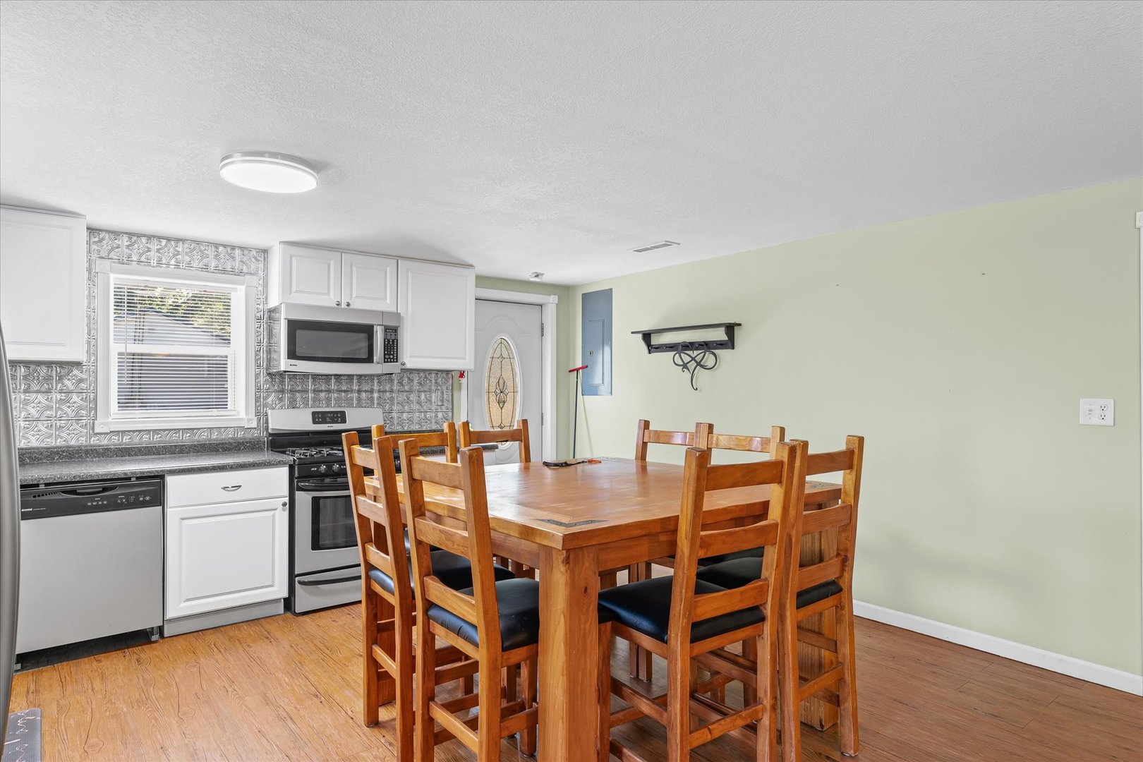 958 North 3555 East Road Neoga, IL 62447 - Photo 12 of 39 a view of a dining room with furniture and wooden floor