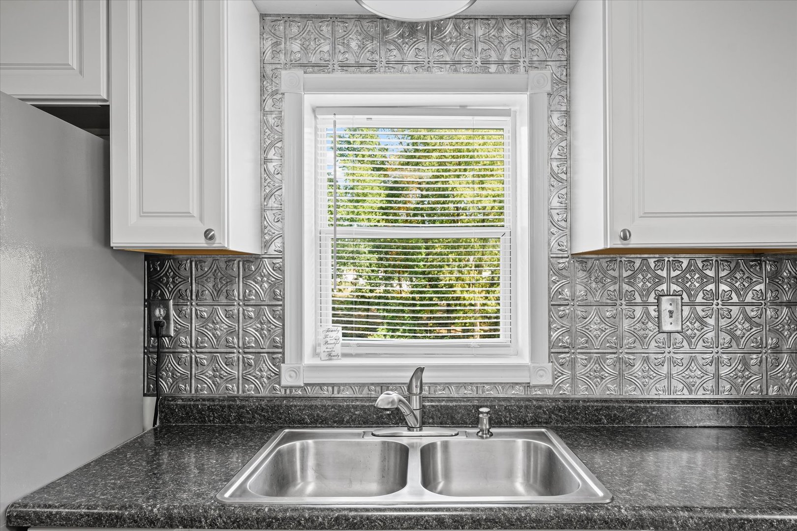 958 North 3555 East Road Neoga, IL 62447 - Photo 13 of 39 a kitchen with a sink cabinets and window