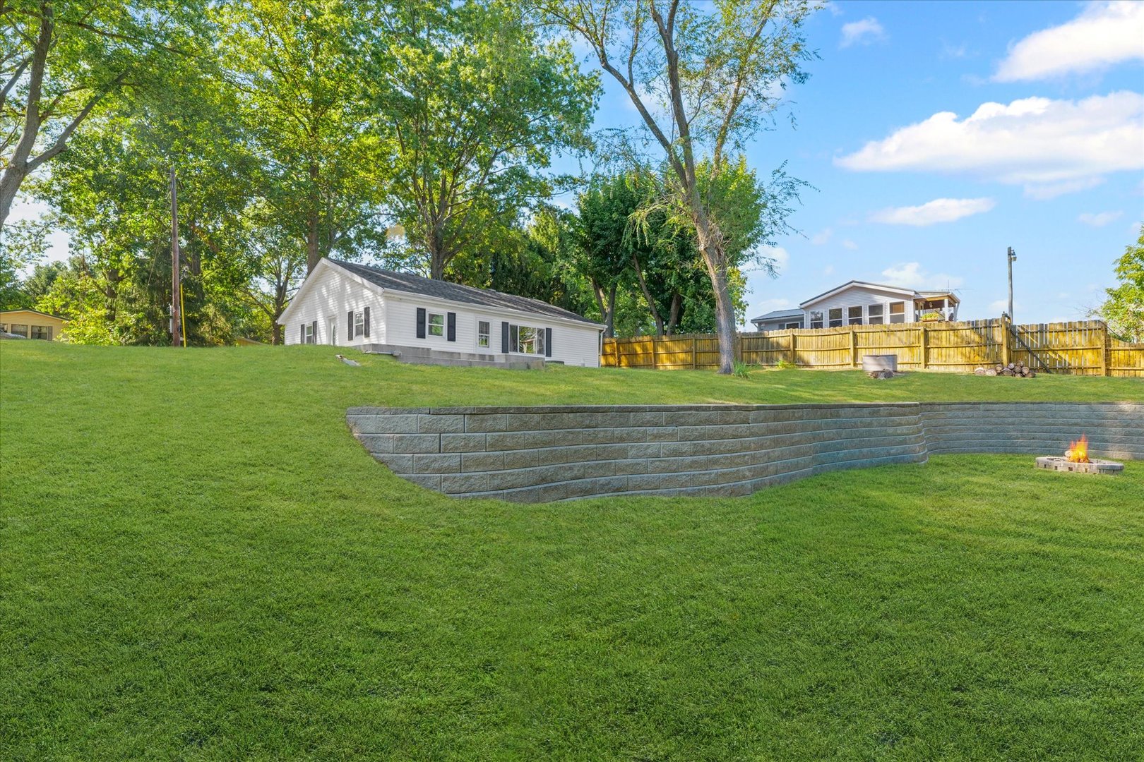 958 North 3555 East Road Neoga, IL 62447 - Photo 24 of 39 a view of a house next to a big yard with large trees