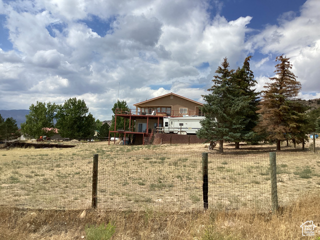 3 Red Circle, Unit 19 Manila, UT 84046 - Photo 5 of 29 View of yard with a deck and stairs