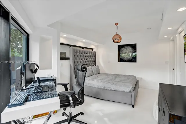 a bathroom with a toilet sink and shower