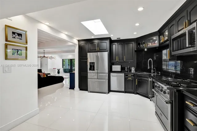 a view of a house with swimming pool and sitting area