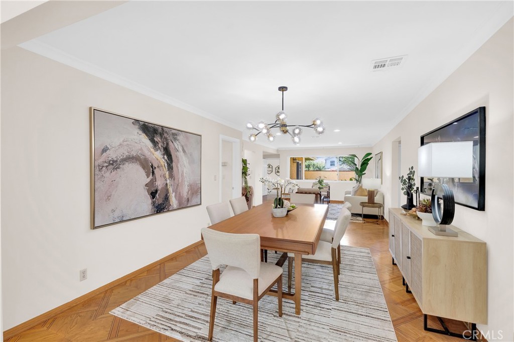 2395 Cooley Place Pasadena, CA 91104 - Photo 13 of 46 a view of a dining room with furniture and wooden floor