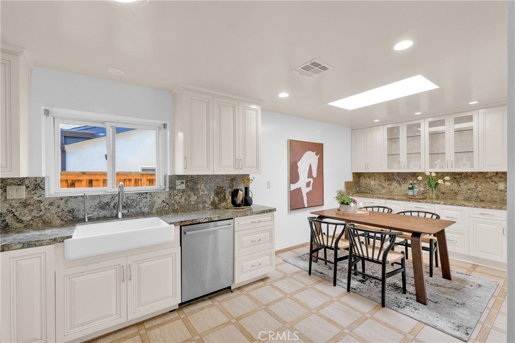2395 Cooley Place Pasadena, CA 91104 - Photo 16 of 46 a kitchen with a sink and chairs