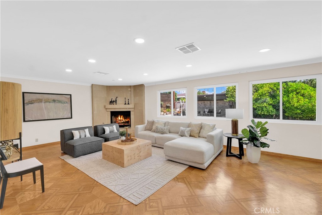 2395 Cooley Place Pasadena, CA 91104 - Photo 18 of 46 a living room with furniture large window and a fireplace