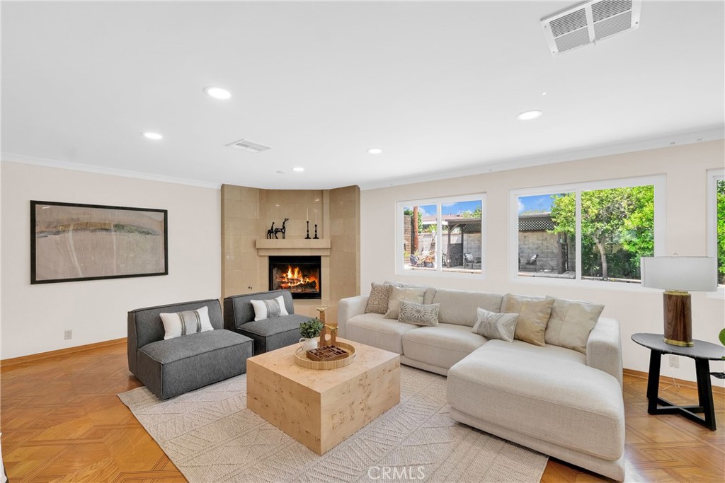 2395 Cooley Place Pasadena, CA 91104 - Photo 20 of 46 a living room with furniture and a fireplace