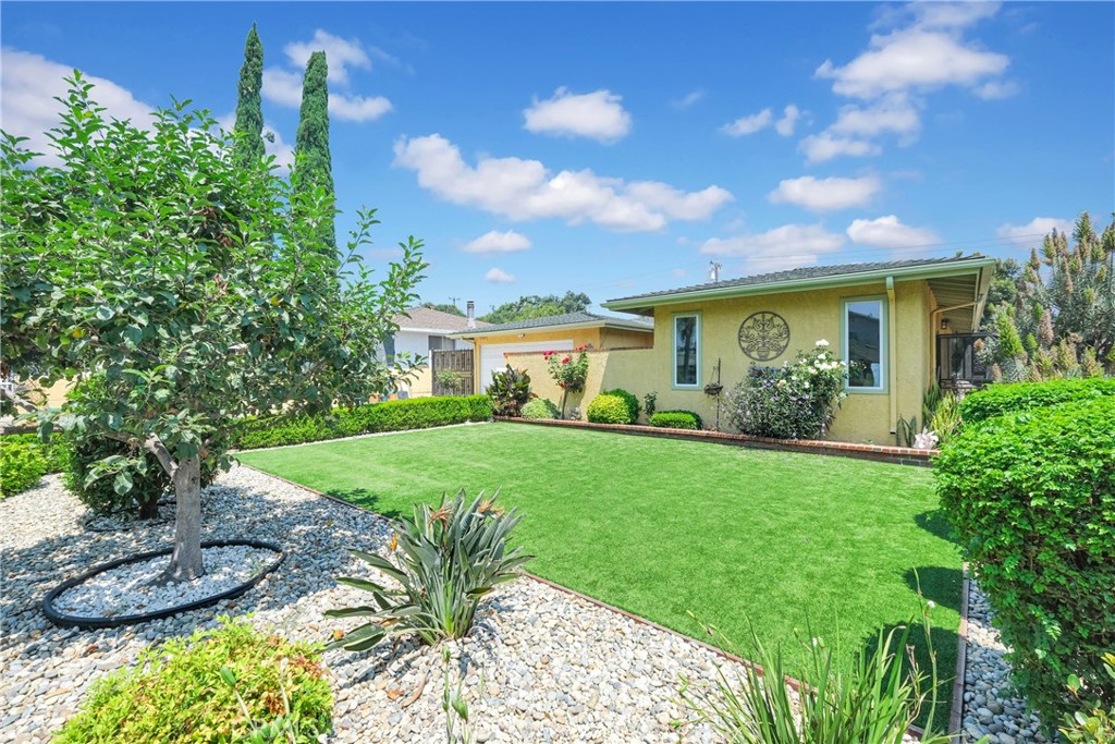 2395 Cooley Place Pasadena, CA 91104 - Photo 2 of 46 a front view of a house with garden
