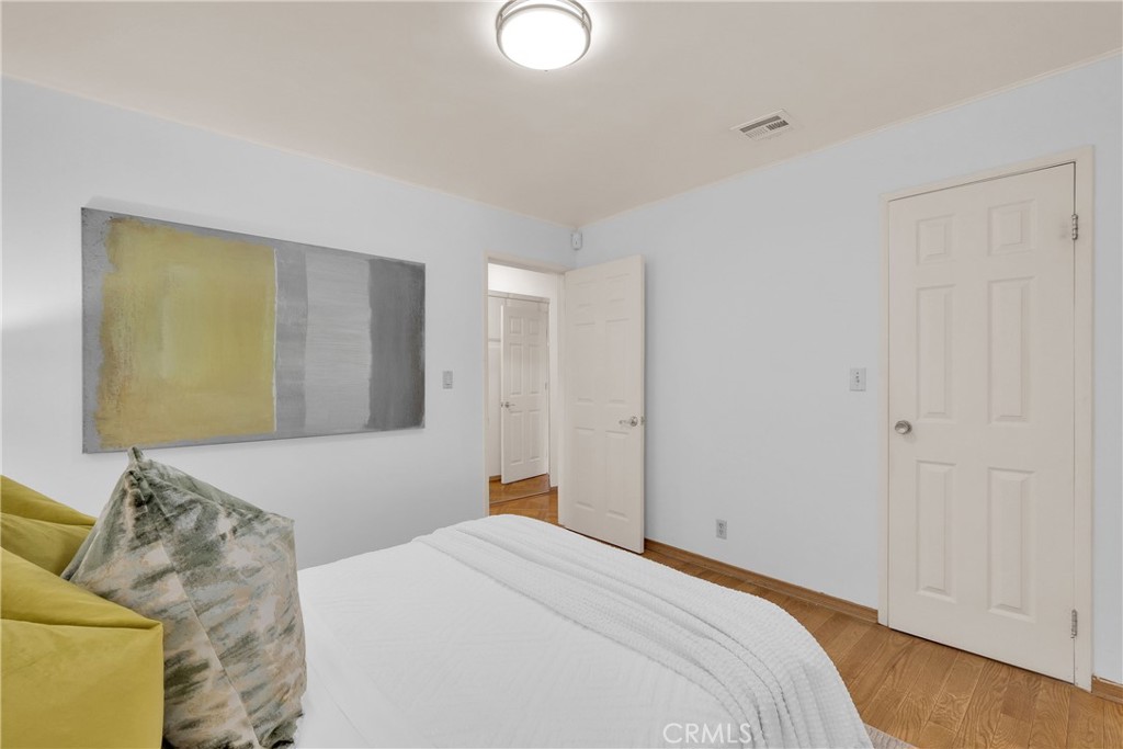 2395 Cooley Place Pasadena, CA 91104 - Photo 24 of 46 a bedroom with a bed and couch