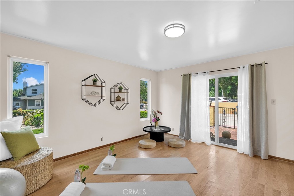 2395 Cooley Place Pasadena, CA 91104 - Photo 27 of 46 a living room with furniture and wooden floor