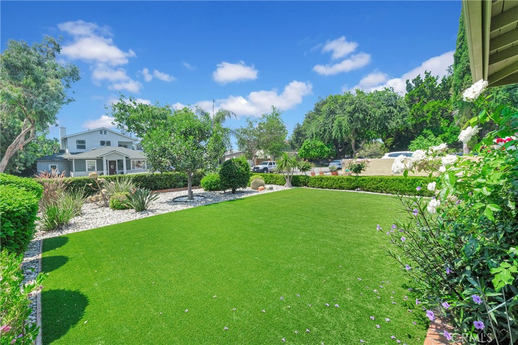 2395 Cooley Place Pasadena, CA 91104 - Photo 3 of 46 a view of yard with swimming pool and green space