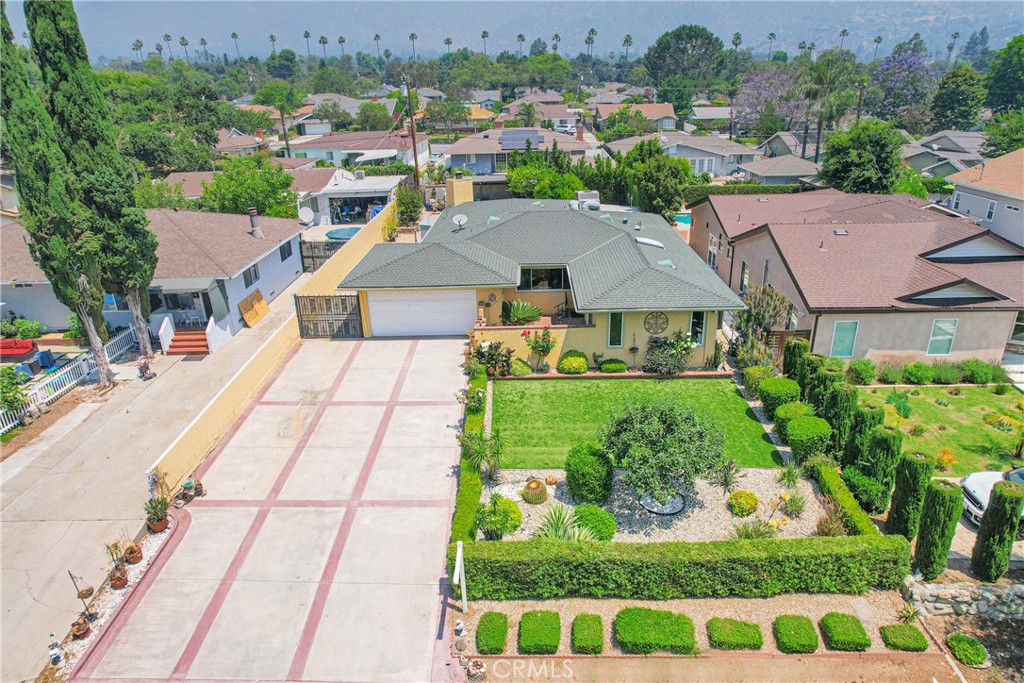 2395 Cooley Place Pasadena, CA 91104 - Photo 42 of 46 an aerial view of multiple houses with a yard