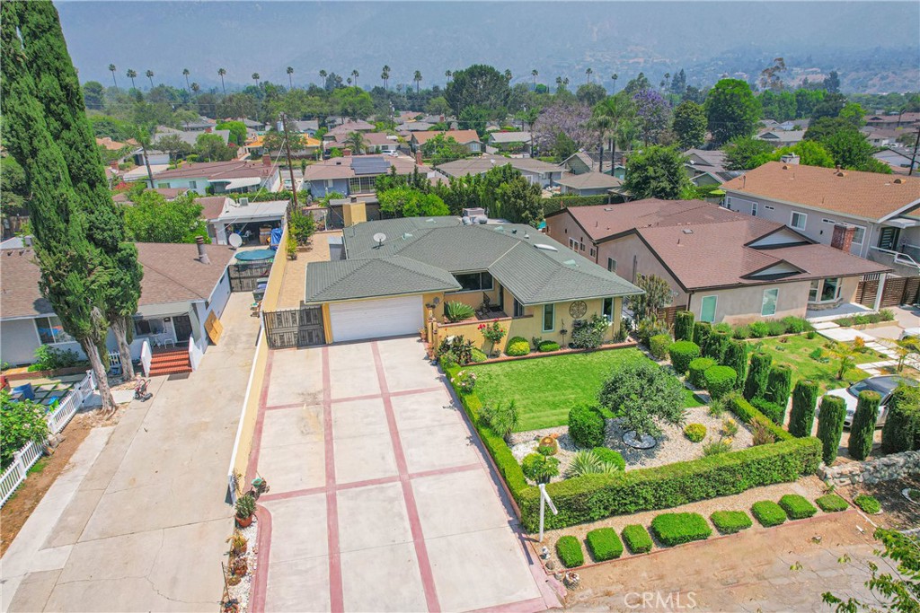 2395 Cooley Place Pasadena, CA 91104 - Photo 43 of 46 an aerial view of multiple houses with a yard