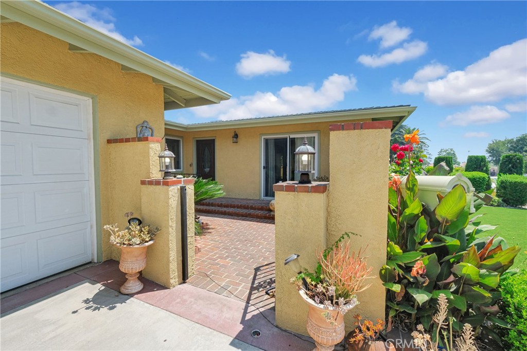 2395 Cooley Place Pasadena, CA 91104 - Photo 5 of 46 a front view of a house with garden