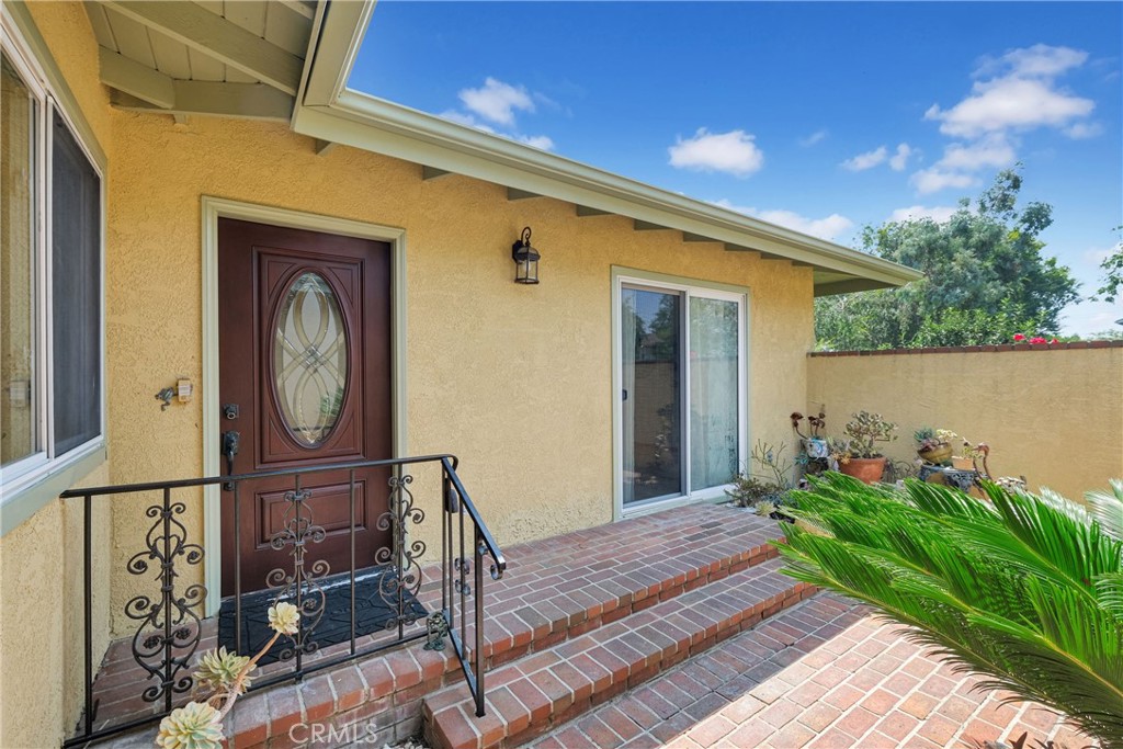 2395 Cooley Place Pasadena, CA 91104 - Photo 7 of 46 a front view of a house with garden