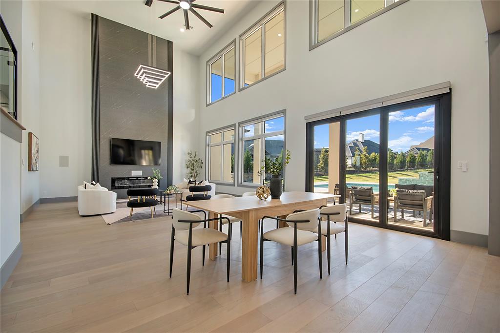421 Sunrise Ridge Drive Heath, TX 75032 - Photo 14 of 39 a view of a dining room with furniture window and outside view