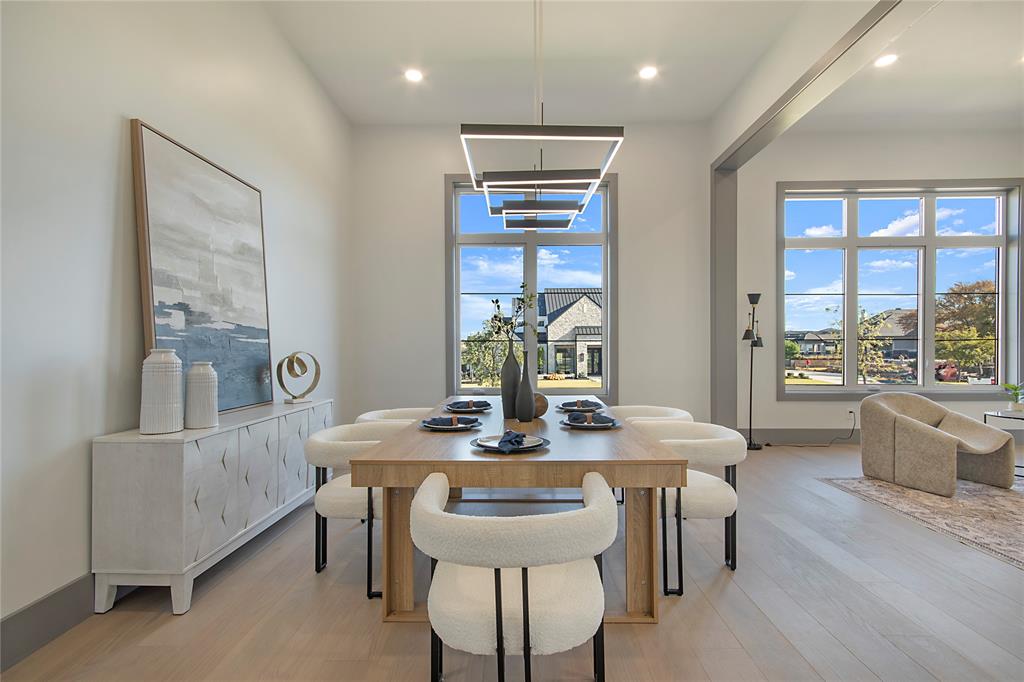 421 Sunrise Ridge Drive Heath, TX 75032 - Photo 19 of 39 a view of a dining room with furniture window and outside view