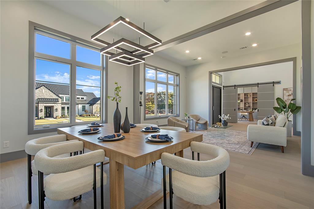 421 Sunrise Ridge Drive Heath, TX 75032 - Photo 20 of 39 a dining room with furniture and window