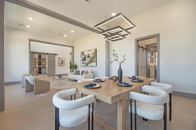 a view of empty room with windows and entryway