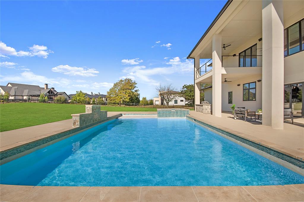 421 Sunrise Ridge Drive Heath, TX 75032 - Photo 3 of 39 a view of an outdoor space and swimming pool