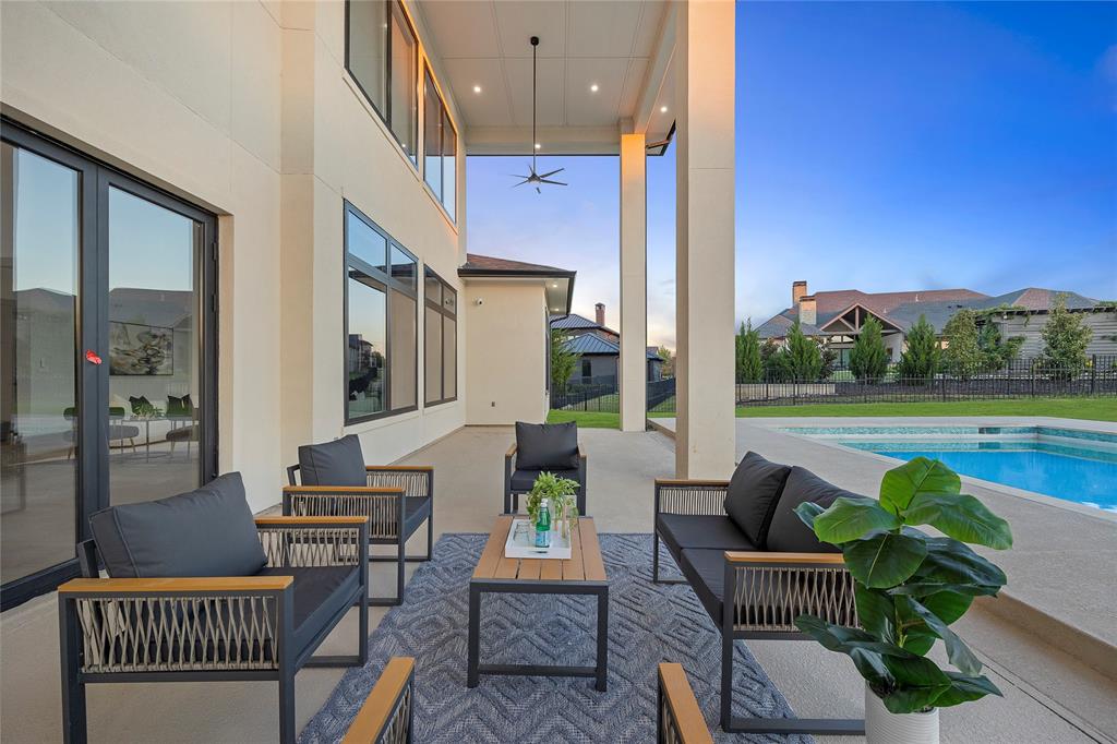 421 Sunrise Ridge Drive Heath, TX 75032 - Photo 34 of 39 a balcony with furniture and a garden