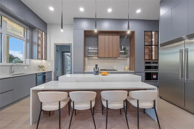 a large kitchen with lots of counter top space