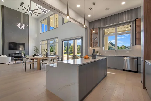 a kitchen with a stove and a sink
