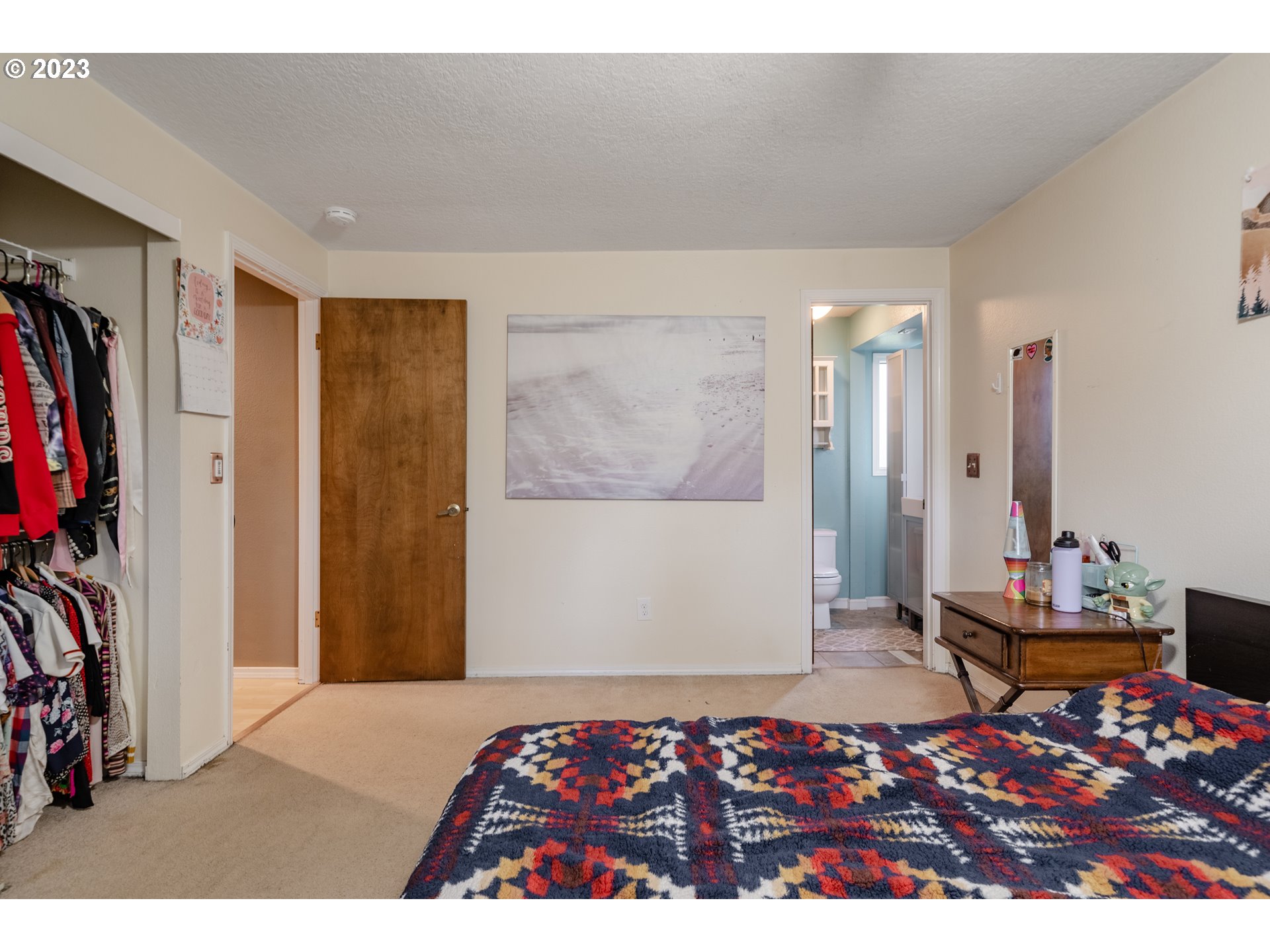 1857 Southwest 5th Street Gresham, OR 97080 - Photo 20 of 40 a bedroom with a bed and a couch