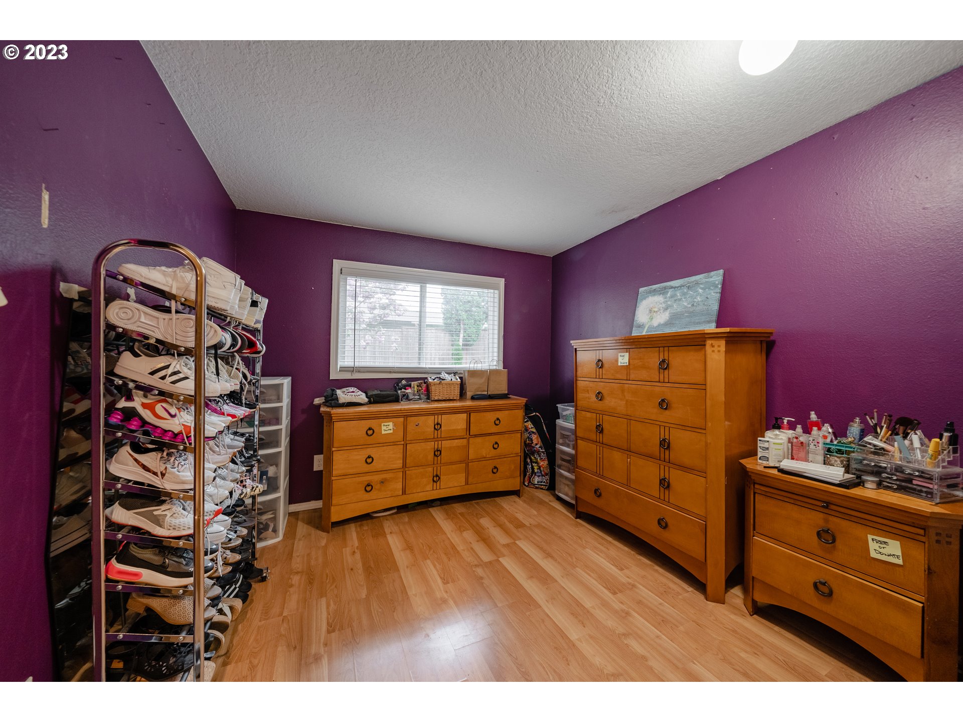 1857 Southwest 5th Street Gresham, OR 97080 - Photo 23 of 40 a kitchen with a wooden floor and a cabinet