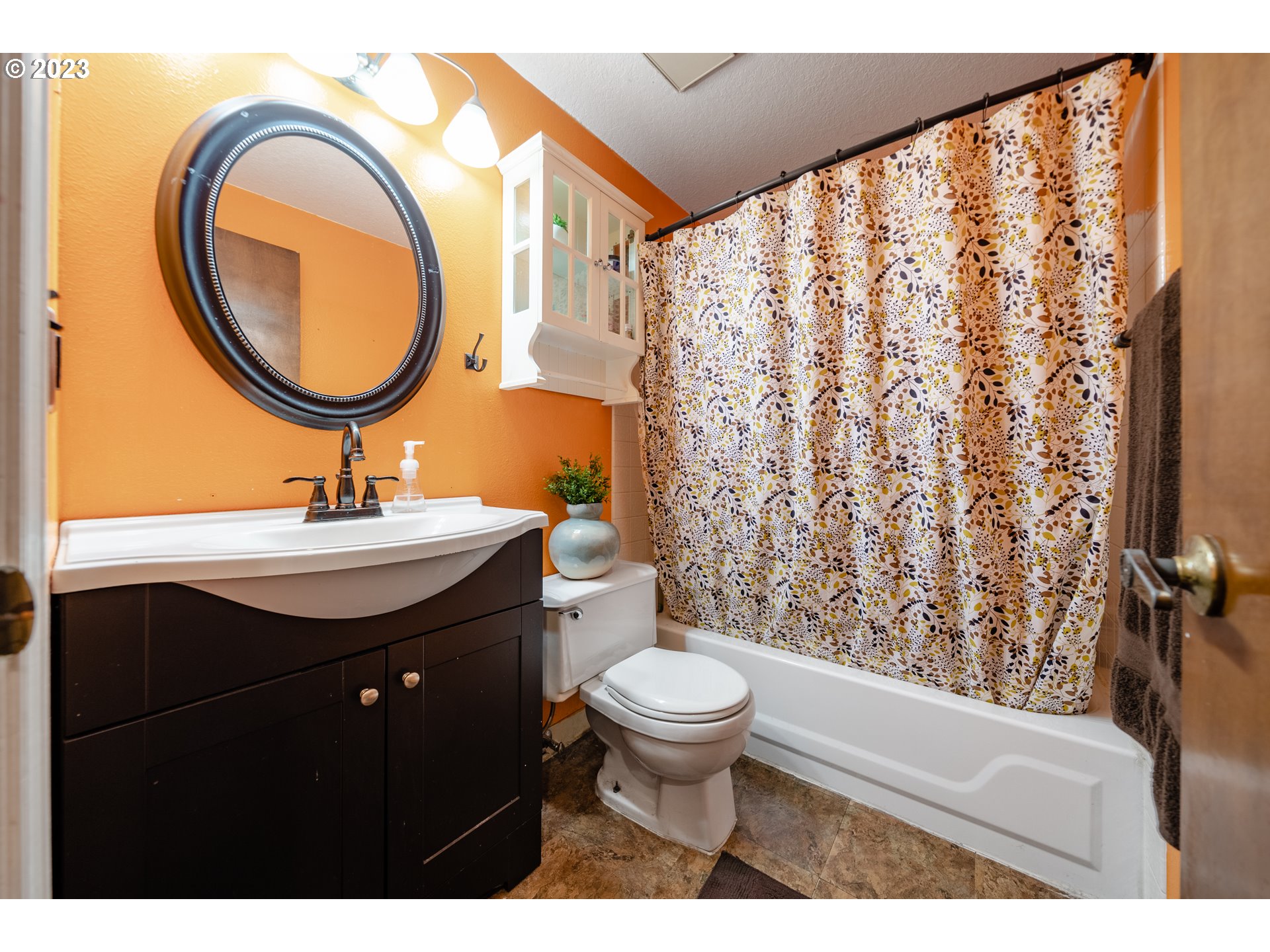 1857 Southwest 5th Street Gresham, OR 97080 - Photo 24 of 40 a bathroom with a sink a toilet and a mirror