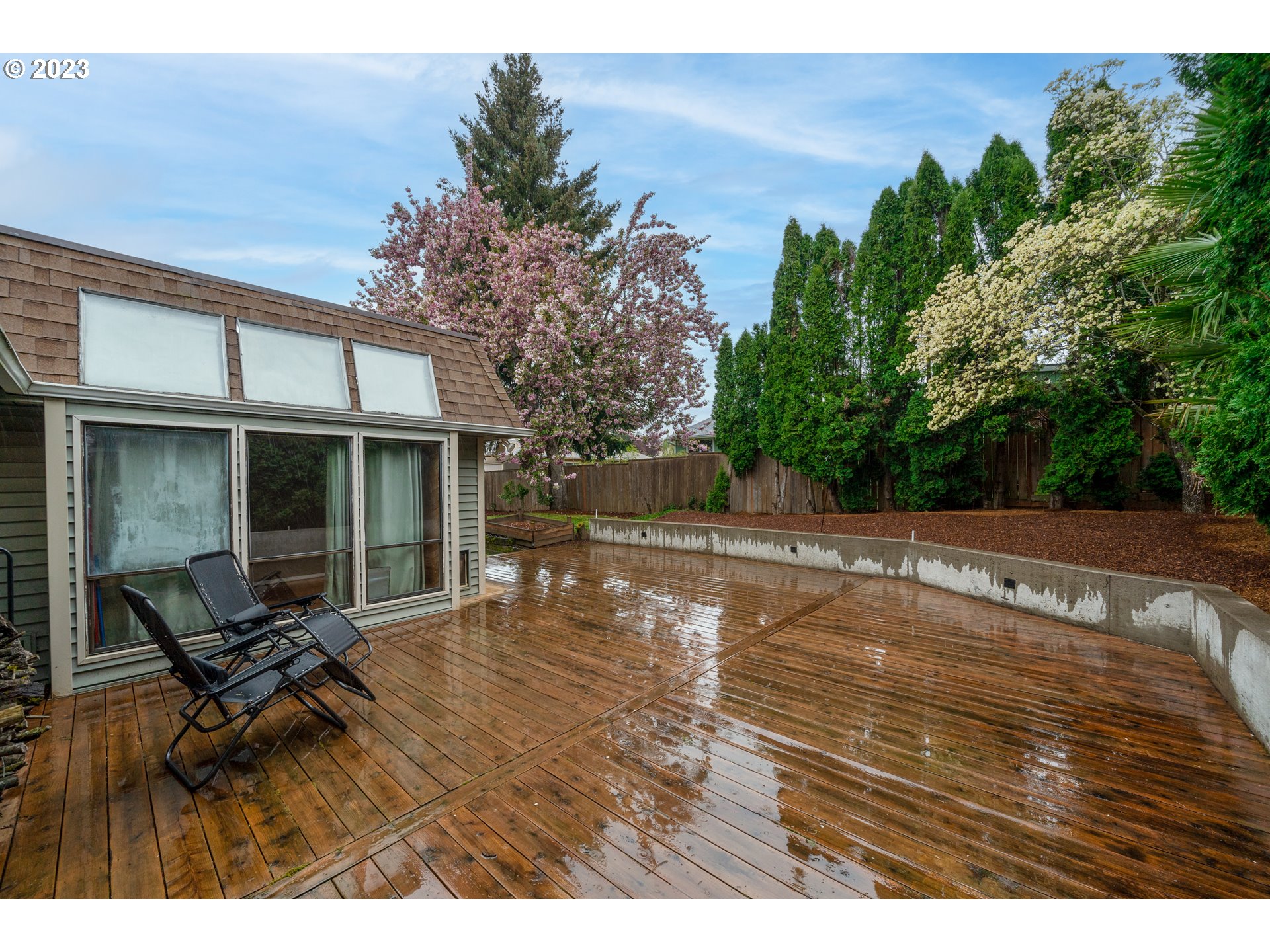 1857 Southwest 5th Street Gresham, OR 97080 - Photo 29 of 40 a view of a backyard with sitting area
