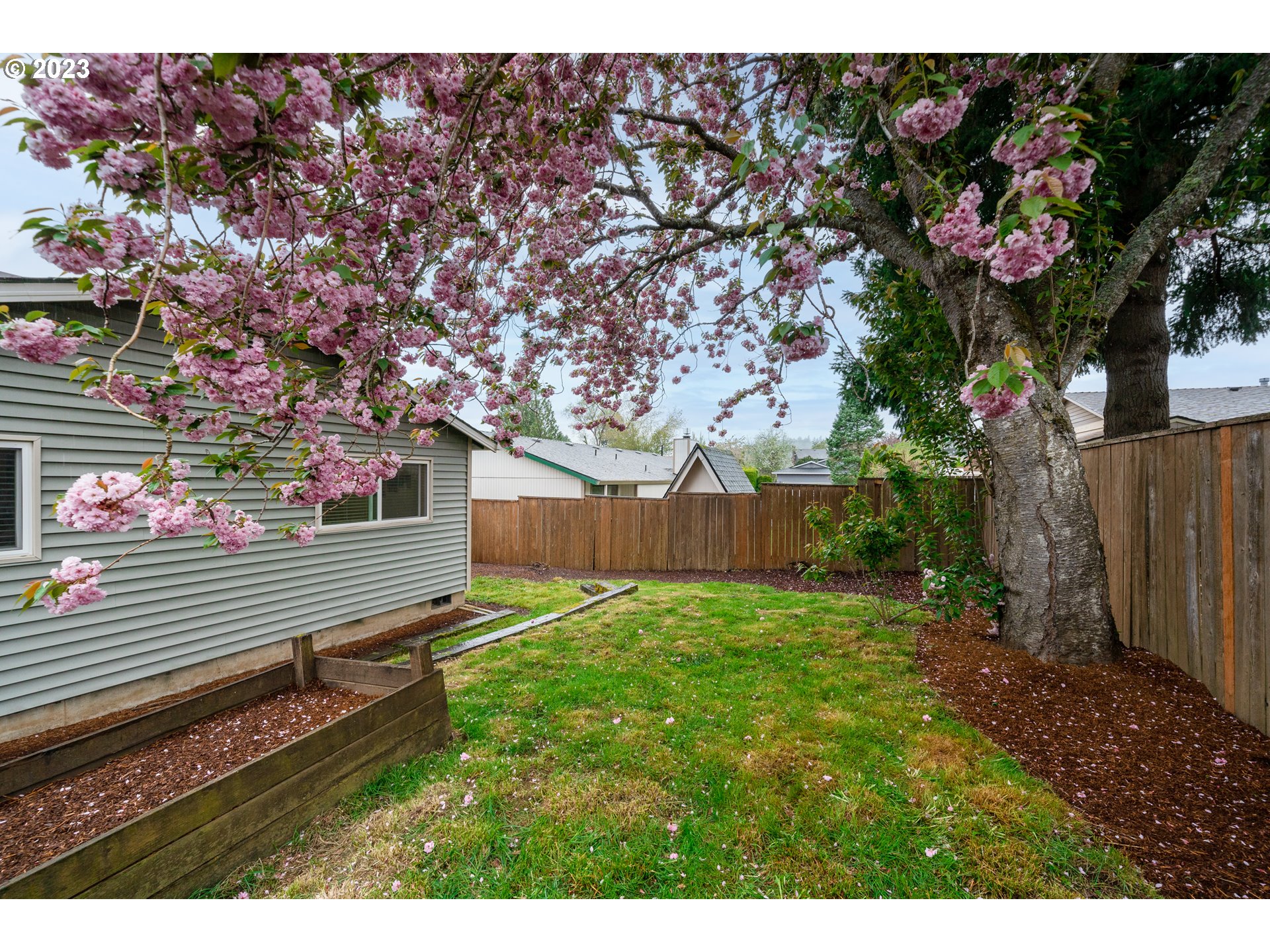 1857 Southwest 5th Street Gresham, OR 97080 - Photo 34 of 40 a view of a backyard with wooden fence