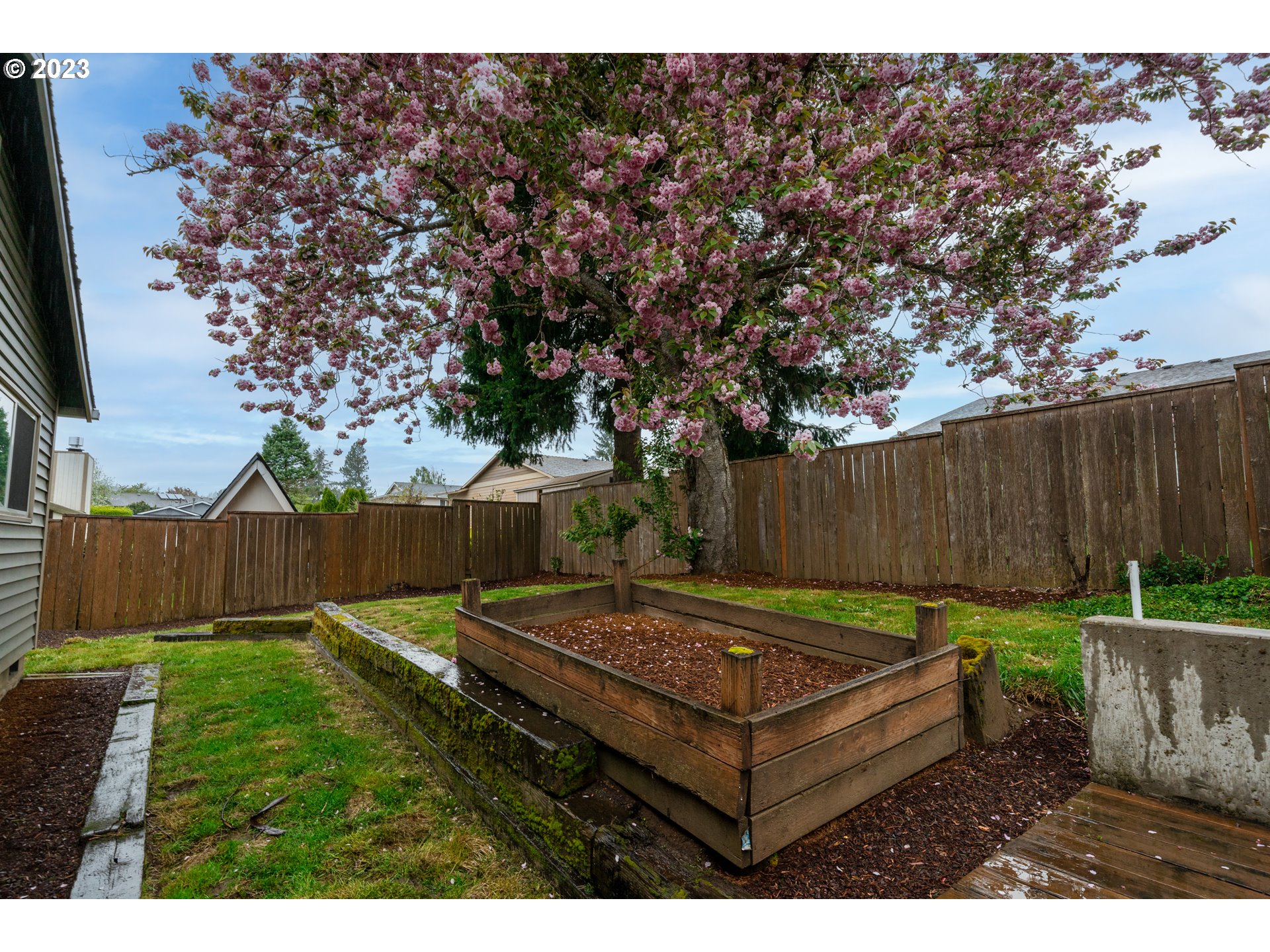 1857 Southwest 5th Street Gresham, OR 97080 - Photo 35 of 40 a backyard of a house with lots of green space