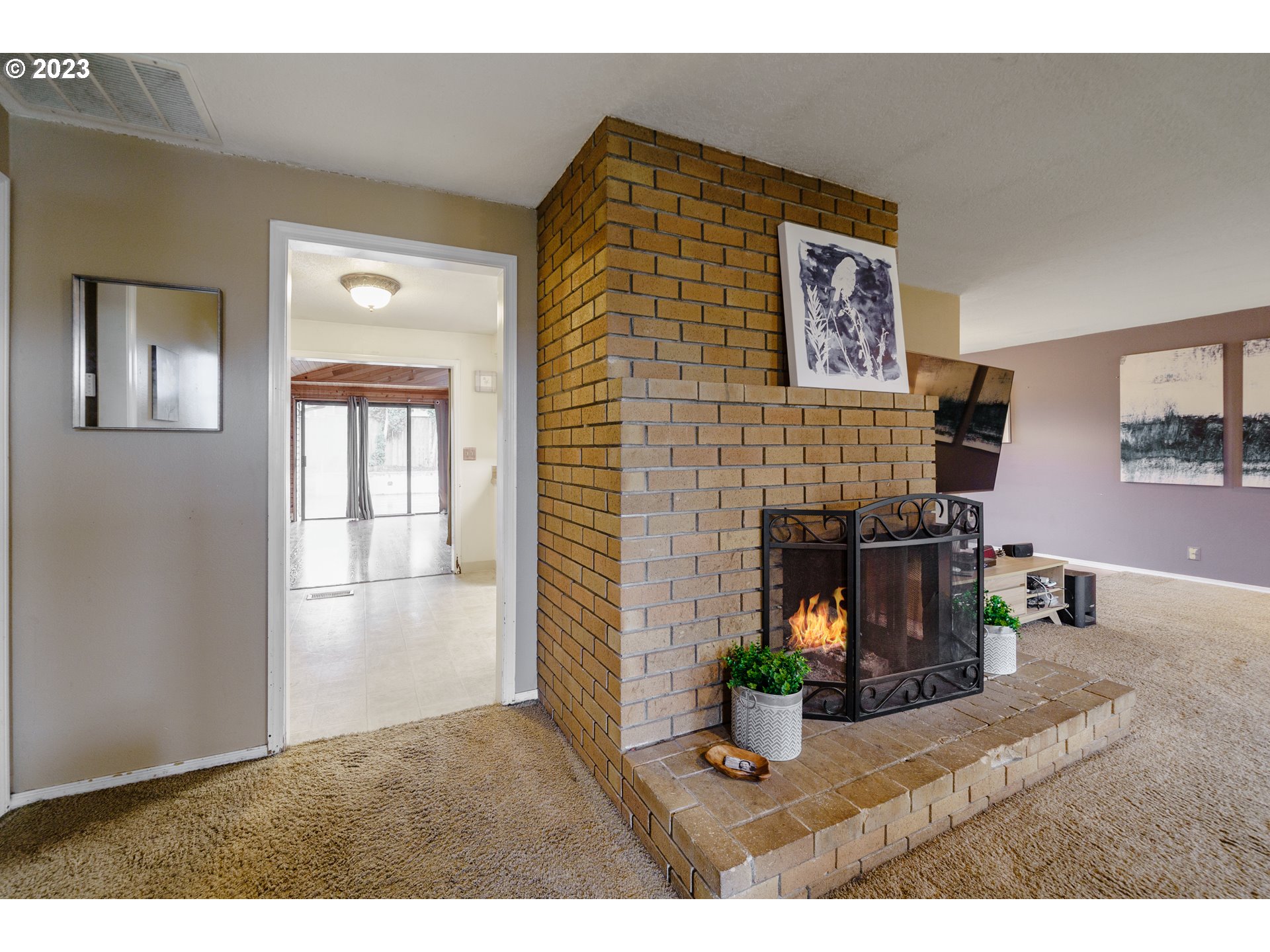 1857 Southwest 5th Street Gresham, OR 97080 - Photo 6 of 40 a living room with furniture and a fireplace