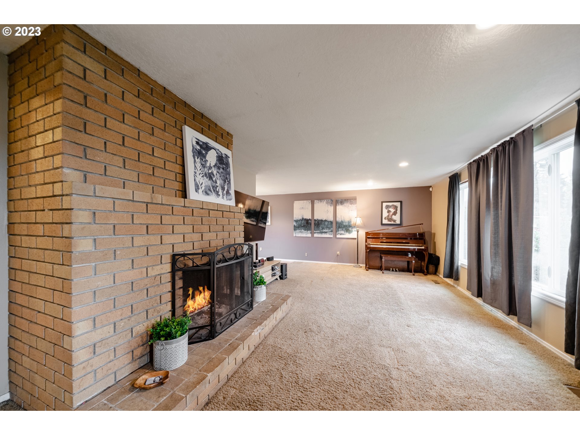 1857 Southwest 5th Street Gresham, OR 97080 - Photo 7 of 40 a view of livingroom with furniture and fireplace