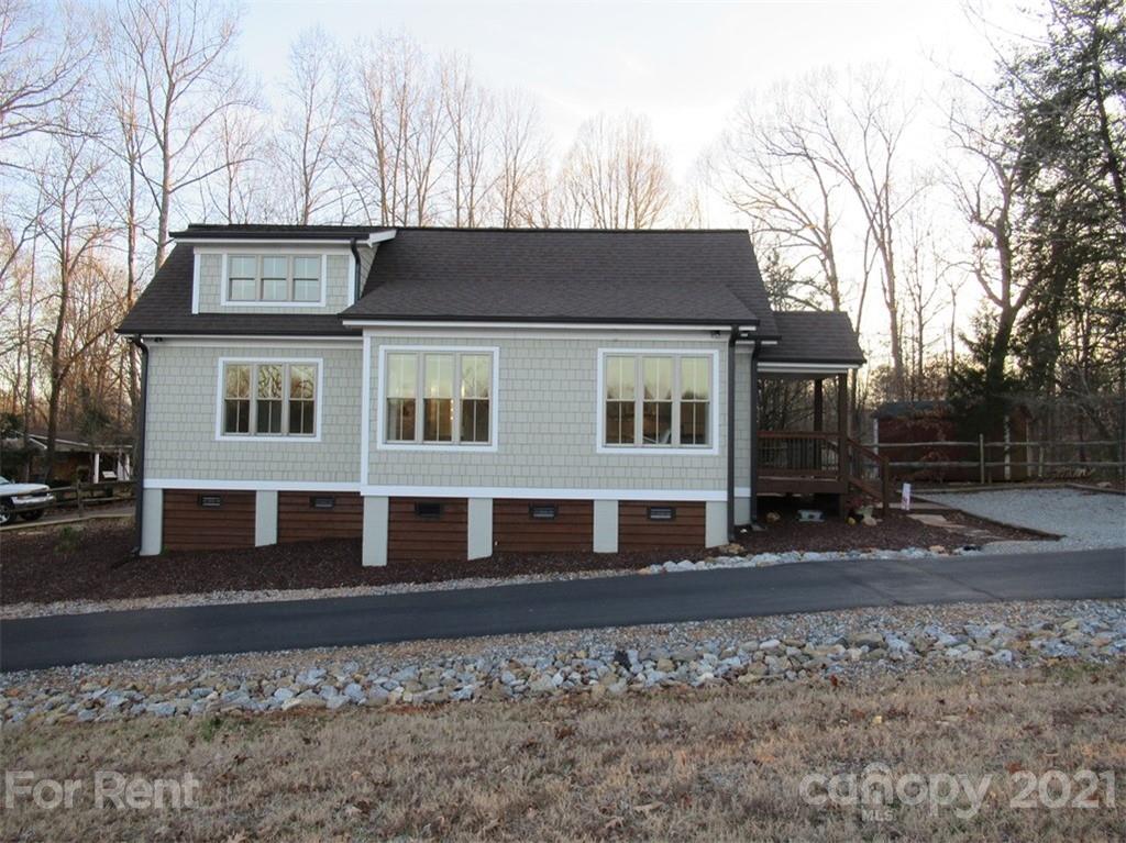 3487 Walker Road, Unit B Maiden, NC 28650 - Photo 2 of 22 a front view of a house with garden