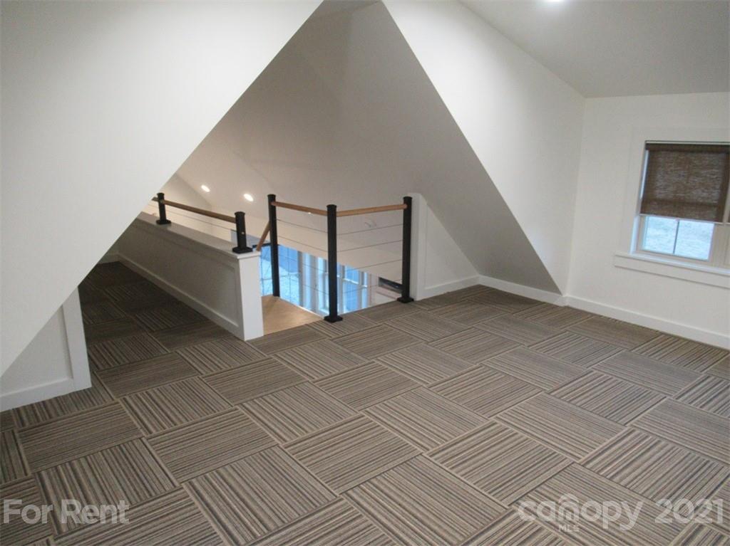 3487 Walker Road, Unit B Maiden, NC 28650 - Photo 16 of 22 a view of an empty room with stairs and stairs