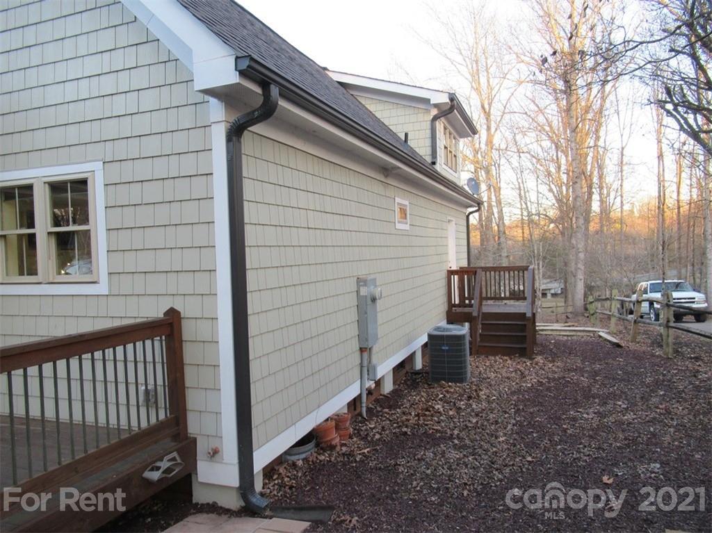 3487 Walker Road, Unit B Maiden, NC 28650 - Photo 18 of 22 a view of a backyard with sitting area and bench