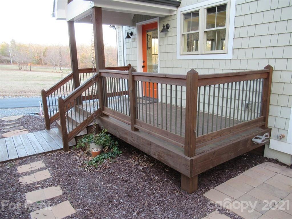 3487 Walker Road, Unit B Maiden, NC 28650 - Photo 19 of 22 a view of a wooden house with a yard