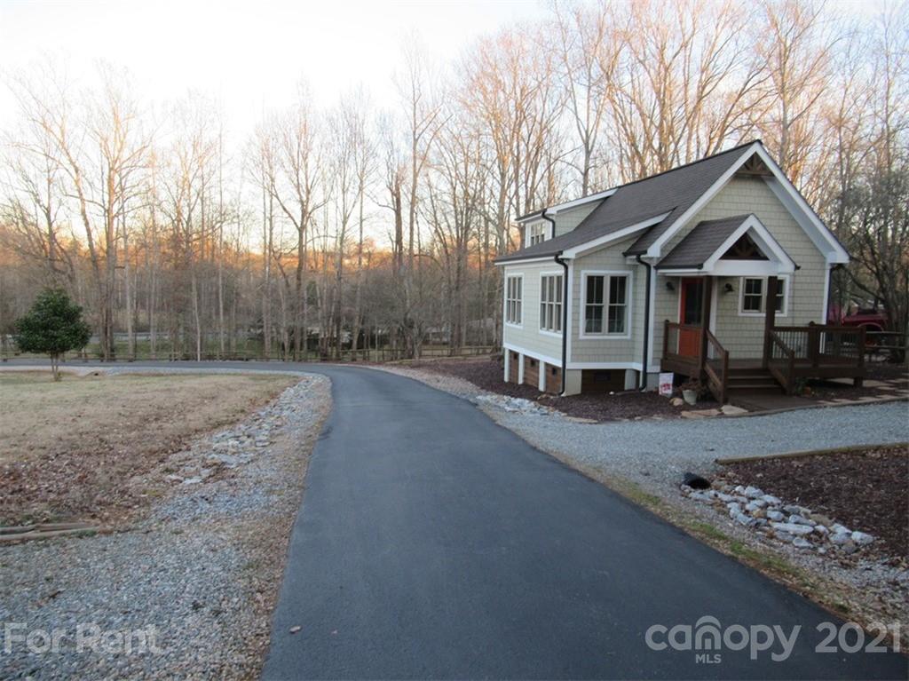3487 Walker Road, Unit B Maiden, NC 28650 - Photo 22 of 22 a view of a house with a yard covered in snow
