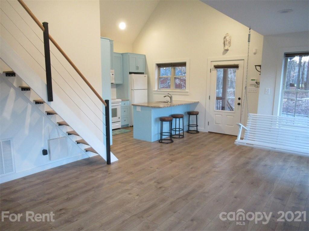 3487 Walker Road, Unit B Maiden, NC 28650 - Photo 5 of 22 a view of entryway and hall with wooden floor