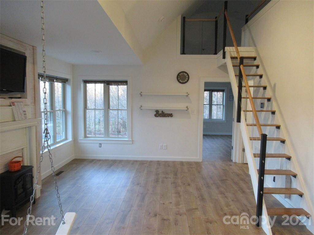 3487 Walker Road, Unit B Maiden, NC 28650 - Photo 6 of 22 a view of wooden floor and windows in a room