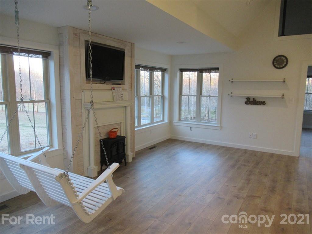 3487 Walker Road, Unit B Maiden, NC 28650 - Photo 7 of 22 a view of livingroom with furniture fireplace and window