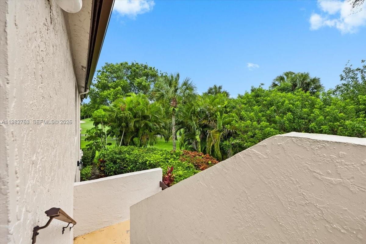 7944 Eastlake Drive, Unit D Boca Raton, FL 33433 - Photo 25 of 29 a view of a backyard