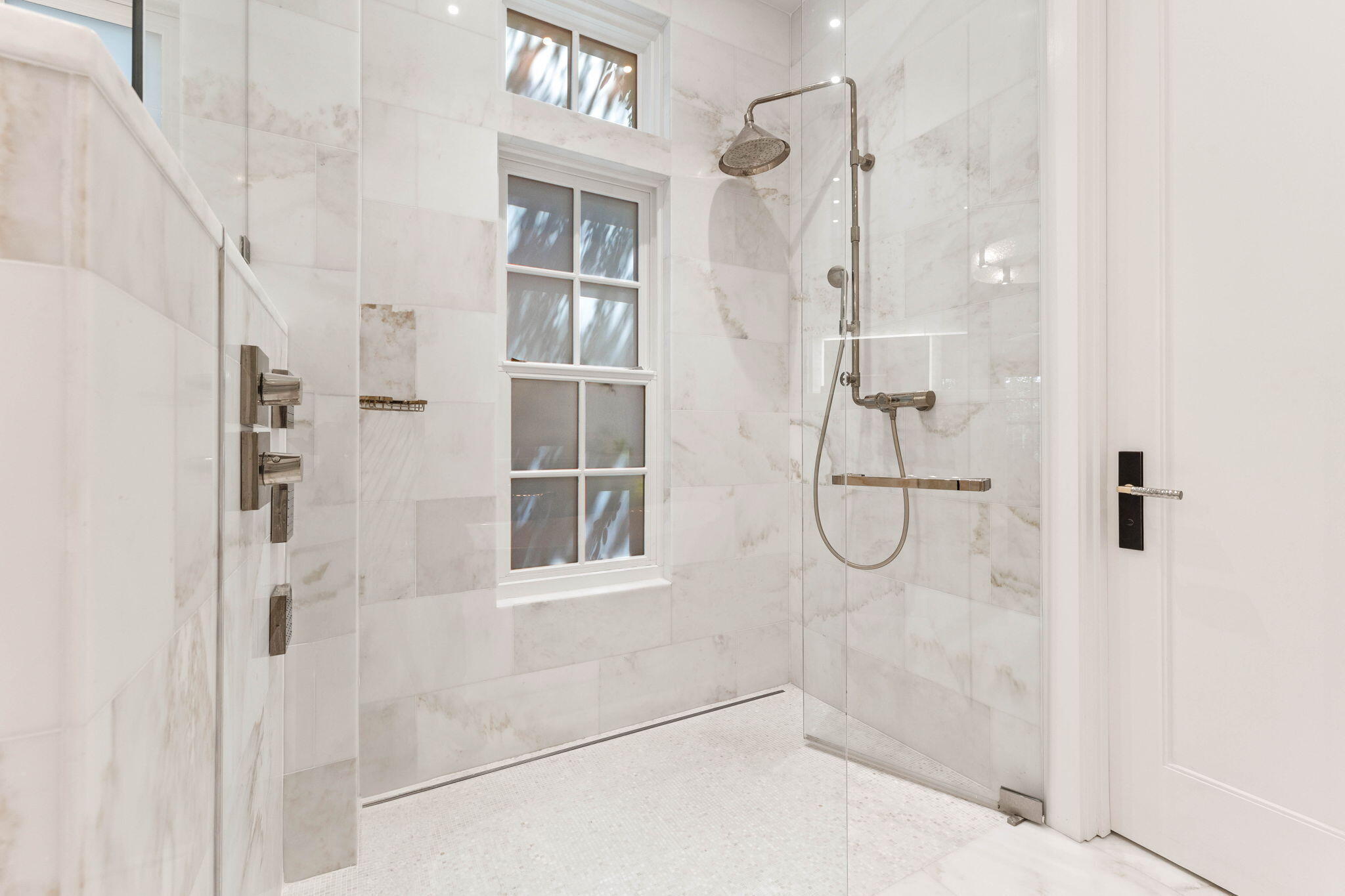 58 Coopersmith Ln Inlet Beach Inlet Beach, FL 32461 - Photo 57 of 130 a bathroom with a glass shower door