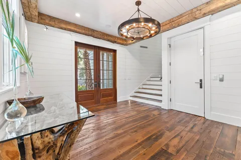 a kitchen with stainless steel appliances granite countertop a stove and refrigerator