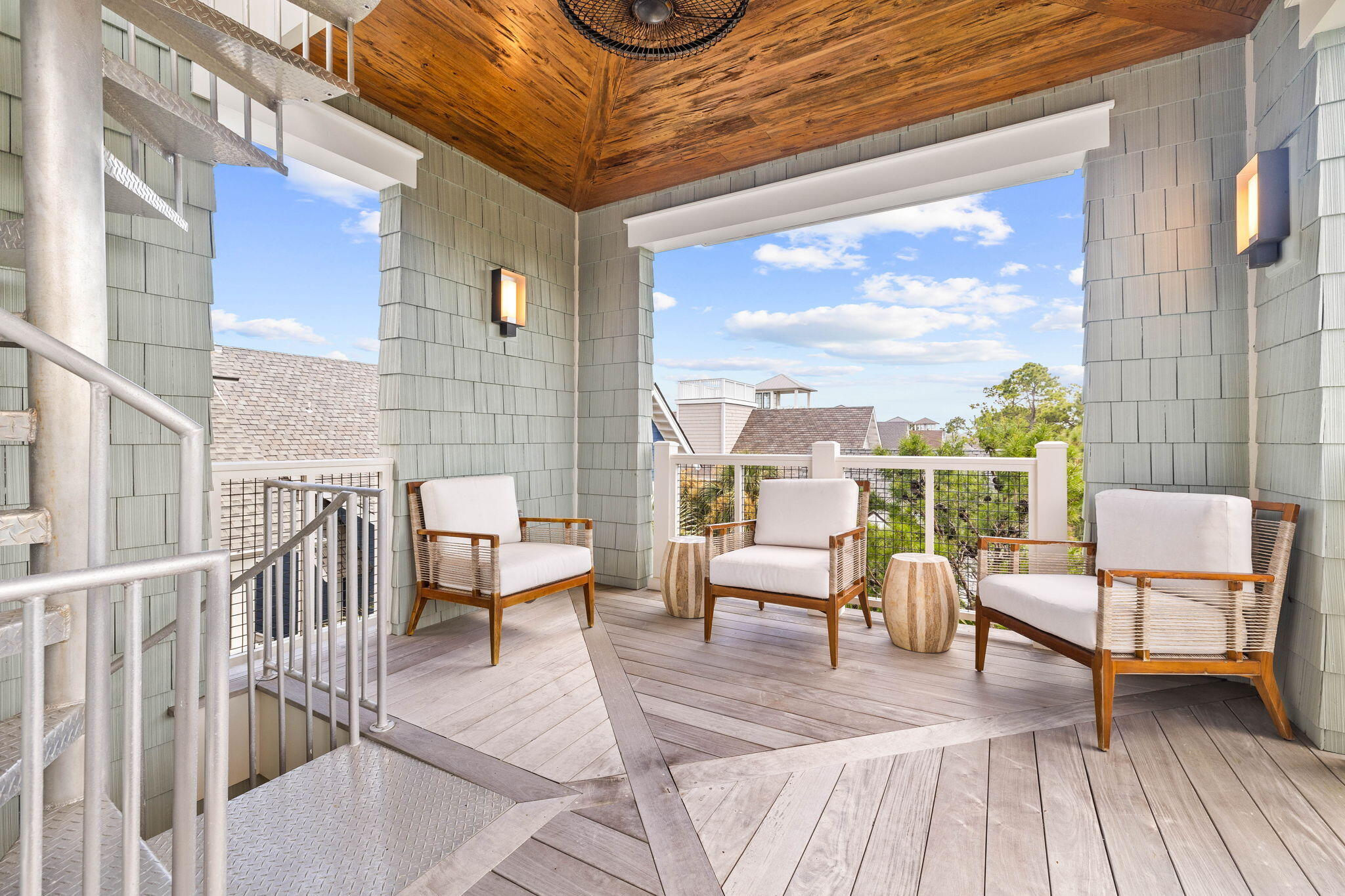 58 Coopersmith Ln Inlet Beach Inlet Beach, FL 32461 - Photo 88 of 130 a balcony with furniture and wooden floor
