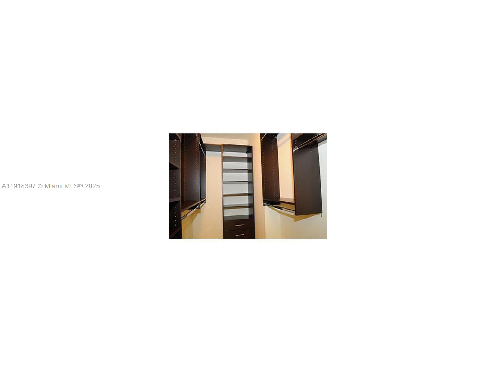 2525 Southwest 3rd Avenue, Unit 704 Miami, FL 33129 - Photo 13 of 13 a hallway with a large window