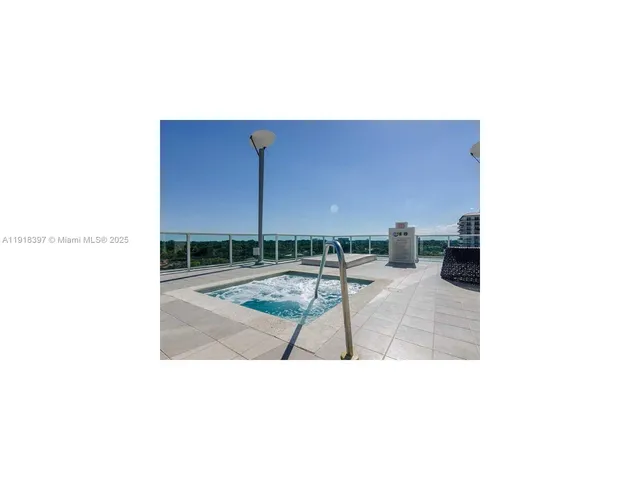 a picture of a living room with furniture