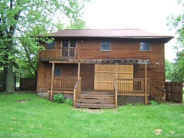 2959 Potter Road Wixom, MI 48393 - Photo 2 of 17 rear